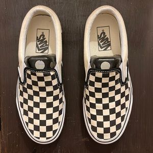 Vans checkered slip ons